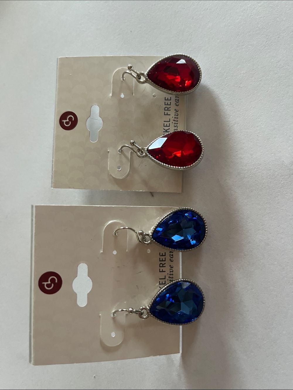 Dressbarn set of 2 pair of earrings blue and red